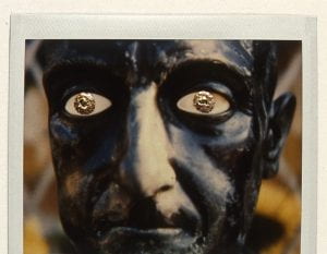 Roman Man (Eyes) Victor Raphael, 1991, metal leaf on Spectra Polaroid, framed 18 inch by 14 inch, courtesy of the artist